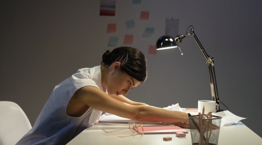 Woman stretching - From Pexels - https://www.pexels.com/photo/female-office-worker-stretching-on-top-of-her-desk-9063398/