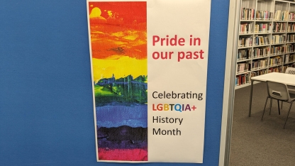 Poster with rainbow design. Caption reads: Pride in our past - celebrating LGBTQIA+ History Month