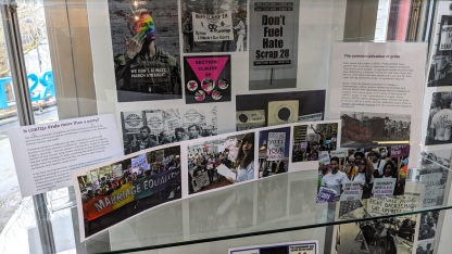 Display of LGBTQ_ posters and photographs. Text panels are titled: Is LGBTQ+ Pride more than a party, The commercialisation of pride