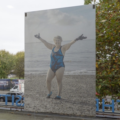 Photo of older woman in a swimming costume on Southsea beach
